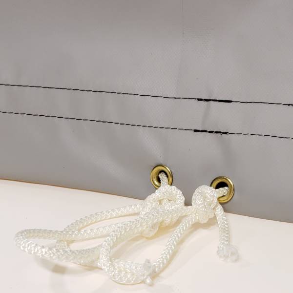 bt-string-solid-braid-rope-drawstring-inserted-into-hem-of-boxed-shaped-tarps-close-up